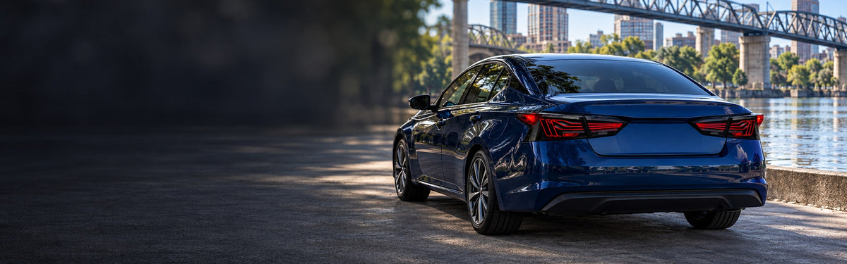 RIGNOX altima tail lights installed scene with clear left copy space