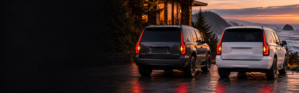 Two Chevrolet Tahoe generations with RIGNOX aftermarket tail lights at a coastal lodge