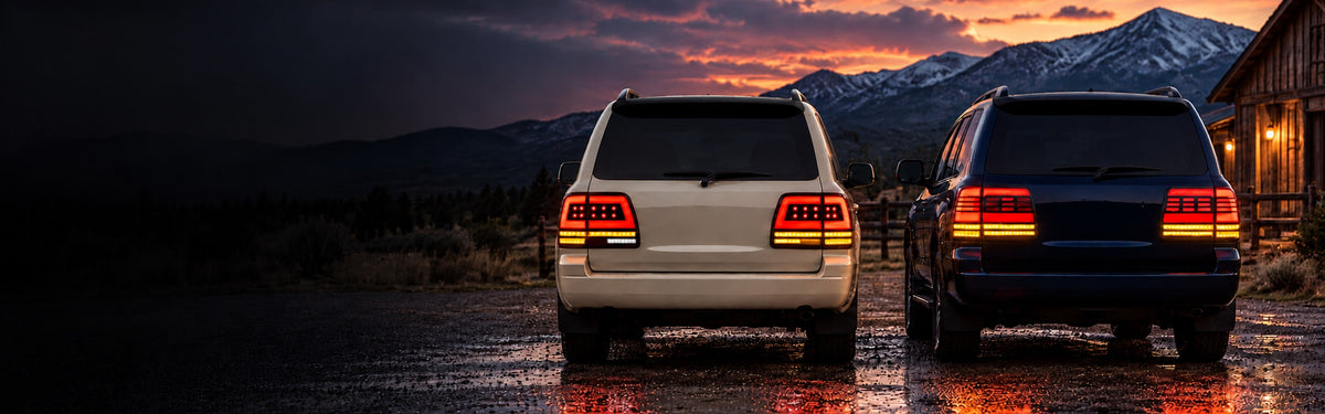 Toyota Land Cruiser LC100 and LC200 with RIGNOX aftermarket tail lights at a mountain ranch