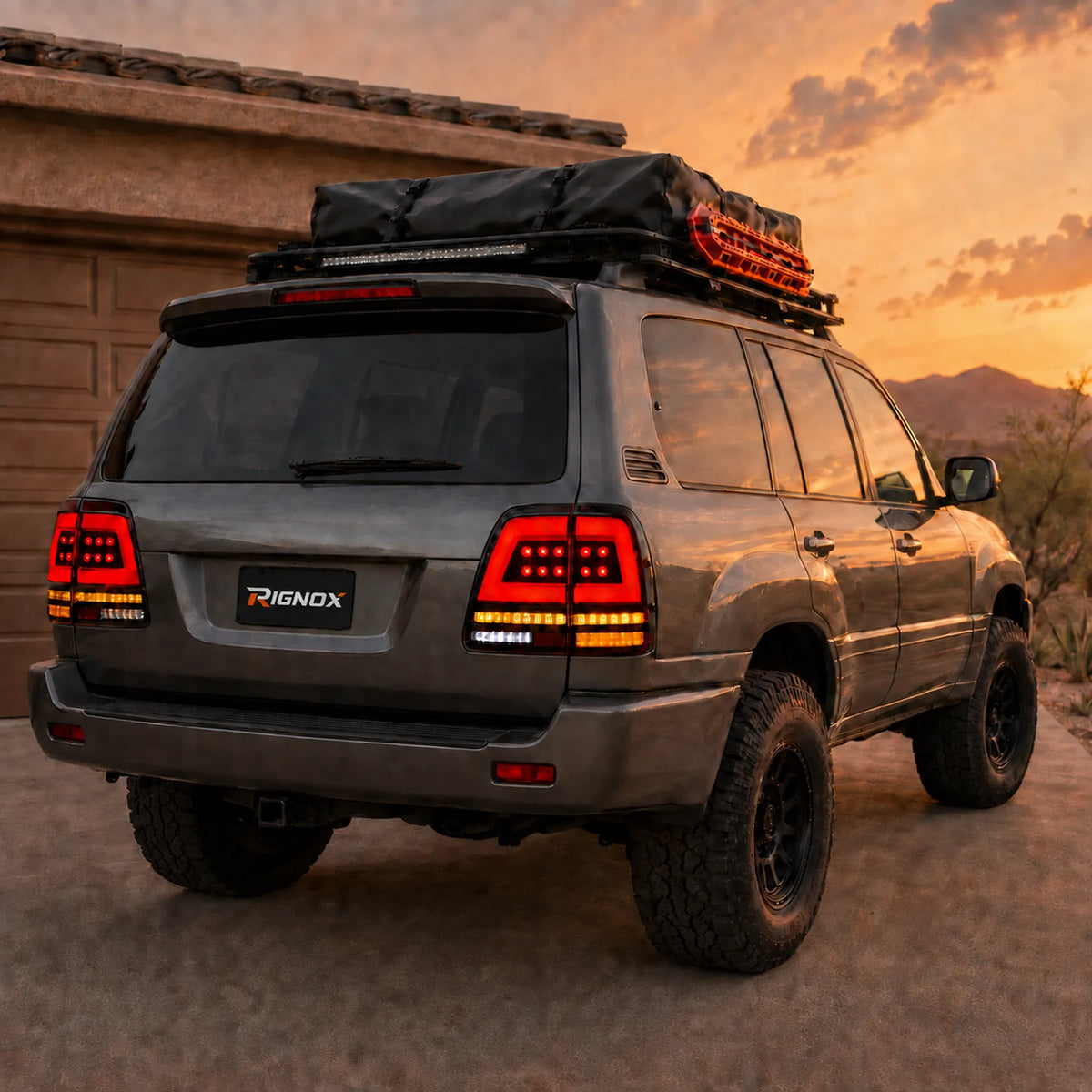 1998-2007 Toyota Land Cruiser 100 Sequential LED Tail Lights Assembly — sunset parking view — T-LC100-98-RW