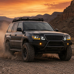 1998-2007 Lexus LX470 LED Triple Projector Headlights — black housing ledprojector sequential turn signal dust gravel