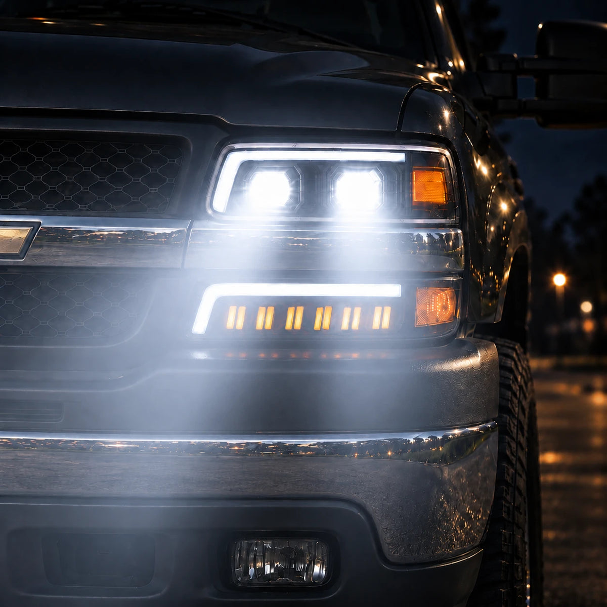 1999-2002 Chevrolet Silverado & 2000-2006 Tahoe / Suburban LED Dual Projector Headlights — lights-on close-up — H-SIL99