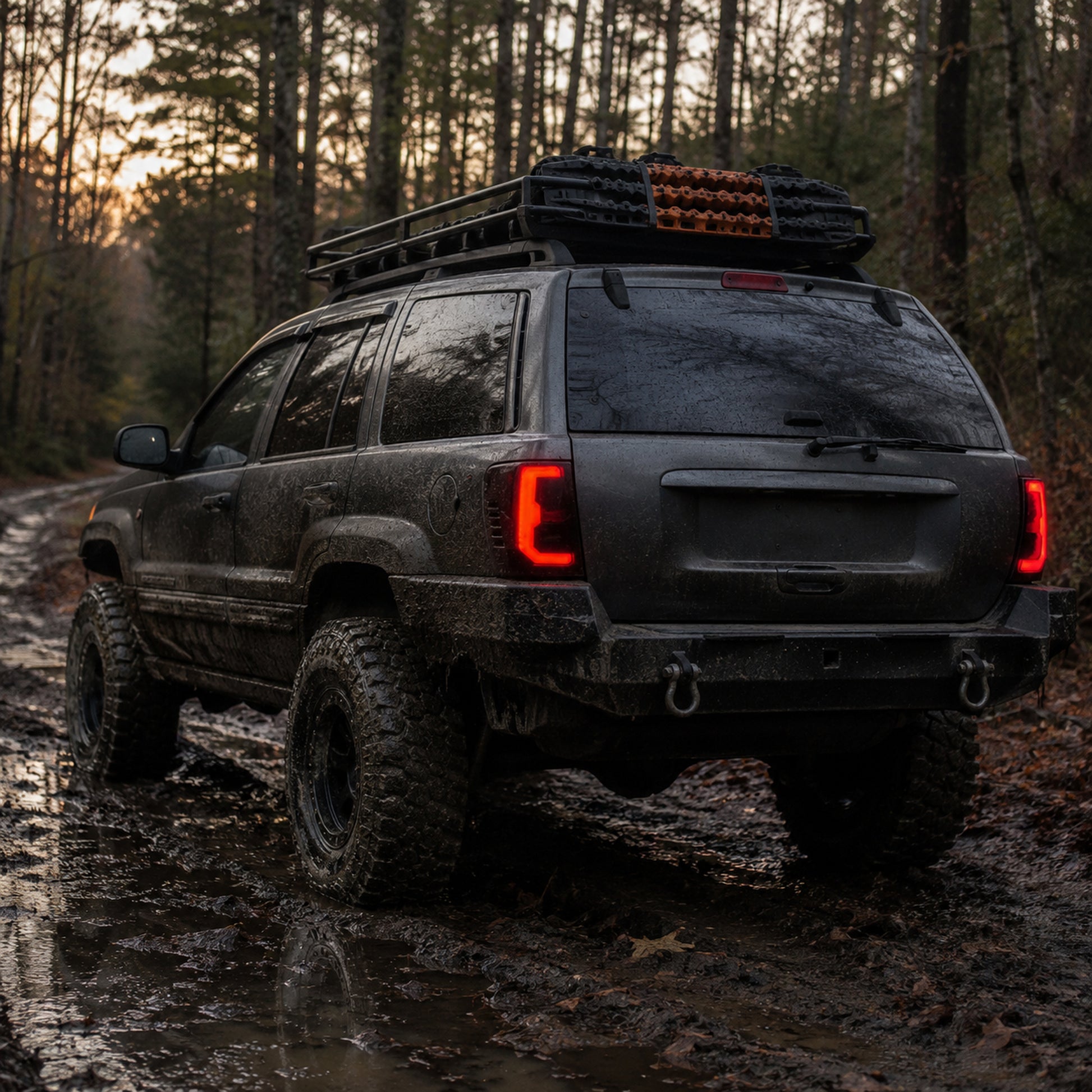 1999-2004 Jeep Grand Cherokee Sequential LED Tail Lights — smoked scene mud trail