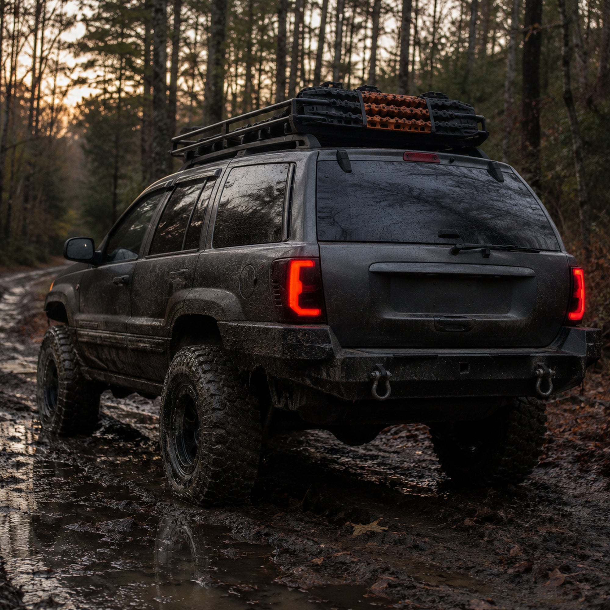 1999-2004 Jeep Grand Cherokee Sequential LED Tail Lights — smoked scene mud trail