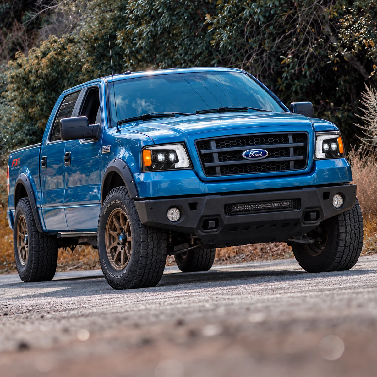 2004-2008 Ford F-150 & 2006-2008 Lincoln Mark LT LED Dual Projector Headlights — blue lifted truck installed view — H-F150-04