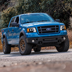 2004-2008 Ford F-150 & 2006-2008 Lincoln Mark LT LED Dual Projector Headlights — blue lifted truck installed view — H-F150-04