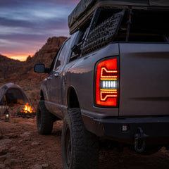 2002-2008 Dodge Ram Sequential LED Tail Lights — smoke red bar camping overland dusk - T-RAM02-06