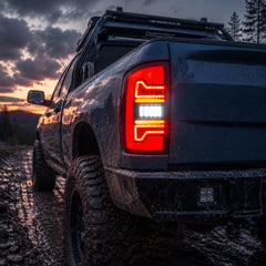 2002-2008 Dodge Ram Sequential LED Tail Lights — smoke red bar mud gravel low angle - T-RAM02-06