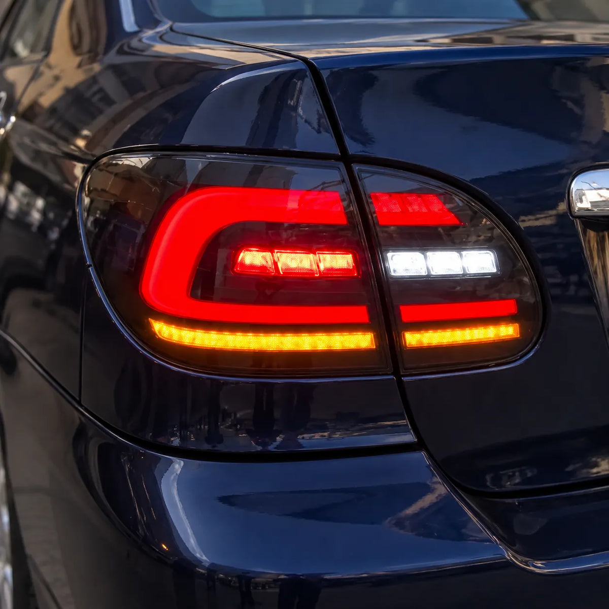2003-2008 Toyota Corolla Sedan Sequential LED Tail Lights Assembly — 4-Piece Set — All LED Lights On Close-Up — T-COR03-SR