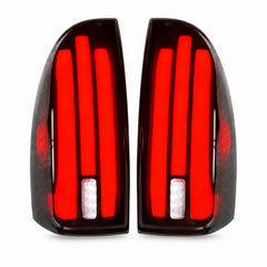 2005-2015 Toyota Tacoma 2nd Gen Sequential LED Tail Lights — smoke red white background lit — T-TAC05