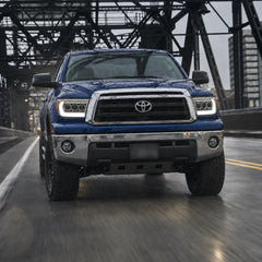 2007-2013 Toyota Tundra & 2008-2017 Sequoia LED Triple Projector Headlights — urban driving installed view — H-TUN07-3P