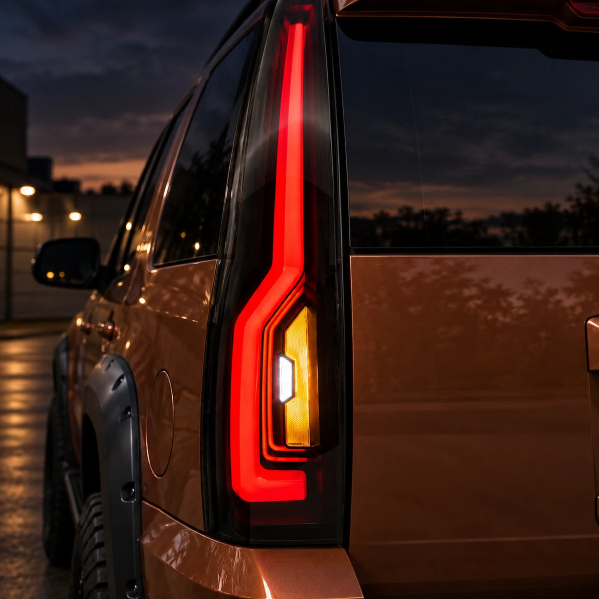 2007-2014 GMC Yukon & Cadillac Escalade LED Tail Lights Assembly — illuminated red amber and white light close-up — T-YUK07-SR
