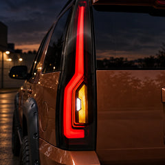 2007-2014 GMC Yukon & Cadillac Escalade LED Tail Lights Assembly — illuminated red amber and white light close-up — T-YUK07-SR
