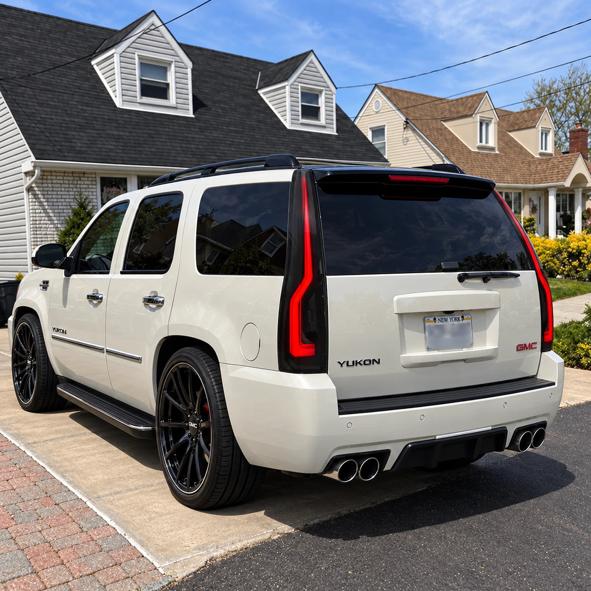 2007-2014 GMC Yukon & Cadillac Escalade LED Tail Lights Assembly — rear three-quarter view in daylight — T-YUK07-SR