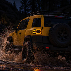 2007-2014 Toyota FJ Cruiser Sequential LED Tail Lights Assembly — Pair (Halo - Smoked RGB) — Amber halo night off-road scene — T-FJ-HL-SRGB