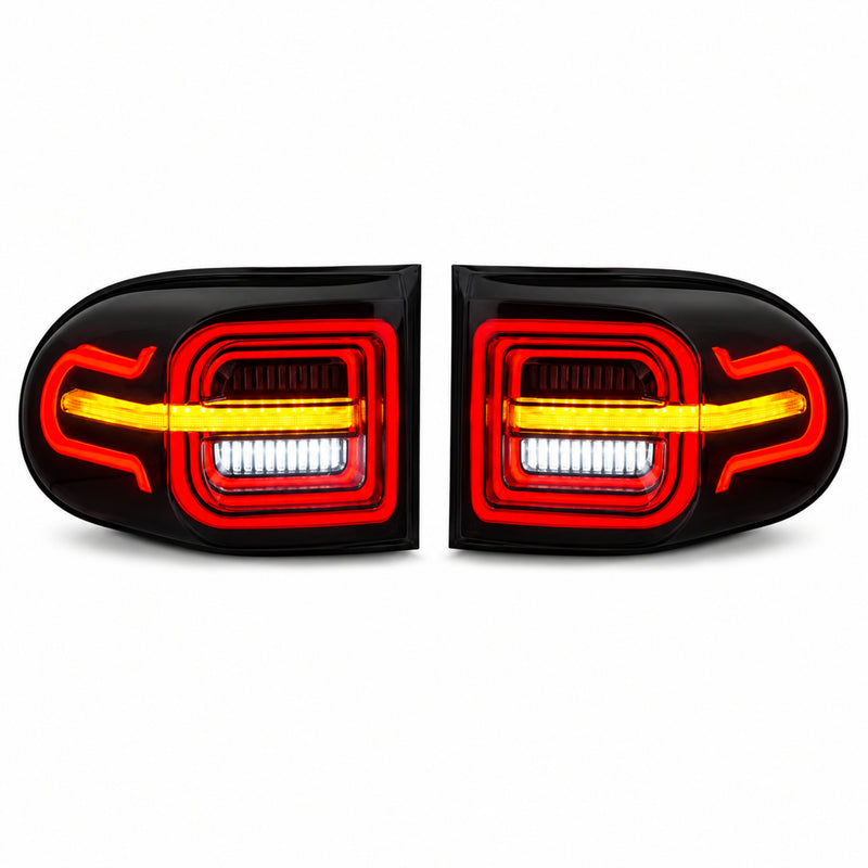 2007-2014 Toyota FJ Cruiser Sequential LED Tail Lights — smoke red white background lit — T-FJ