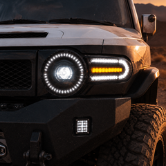 2007-2014 Toyota FJ Cruiser LED Projector Headlights — clear white DRL amber turn signal headlight close up dusk — H-FJ07