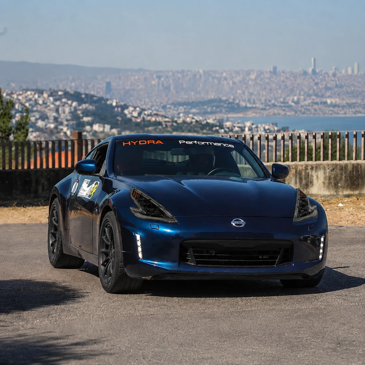 2008-2021 Nissan 370Z Z34 LED Triple Projector Headlights — city skyline view — H-370Z08-RGB