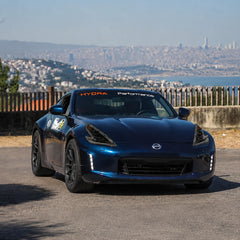 2008-2021 Nissan 370Z Z34 LED Triple Projector Headlights — city skyline view — H-370Z08-RGB