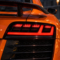2008-2015 Audi R8 Coupe & Spyder Sequential LED Tail Lights Assembly — Pair — Red illuminated tail light close-up — T-R8-08-CW