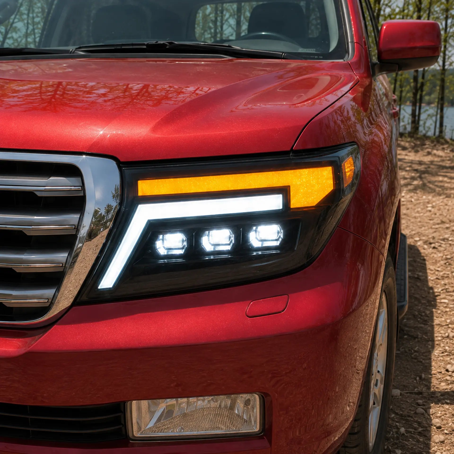 2008-2015 Toyota Land Cruiser 200 LED Triple Projector Headlights Assembly — lights-on close-up — H-LC200-08