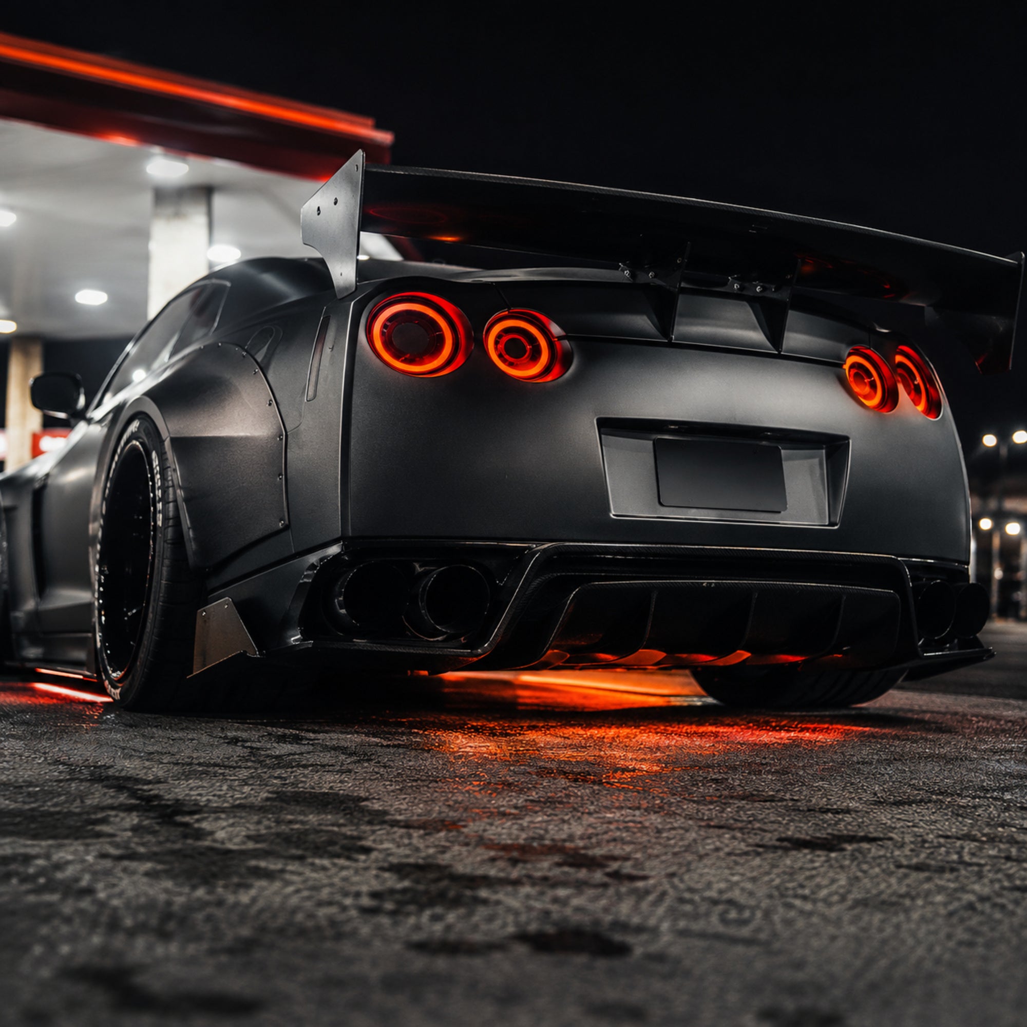 2008-2024 Nissan GT-R R35 Sequential LED Tail Lights — smoke white sequential low angle rear - T-GTR-SW