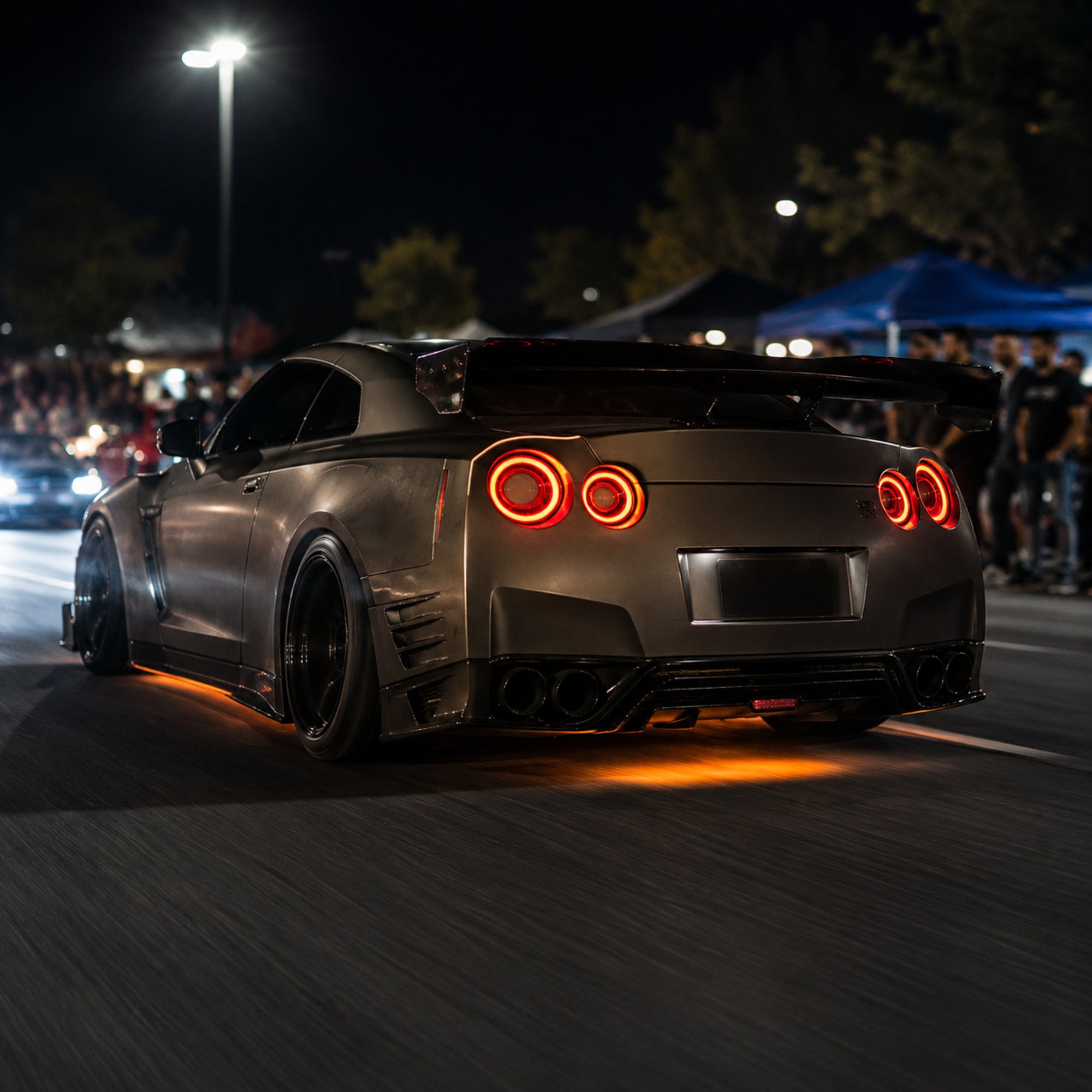 2008-2024 Nissan GT-R R35 Sequential LED Tail Lights — smoke white sequential night motion scene - T-GTR-SW