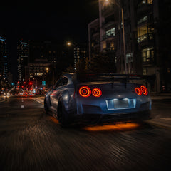 2008-2024 Nissan GT-R R35 Sequential LED Tail Lights — smoke white sequential night rear view - T-GTR-SW