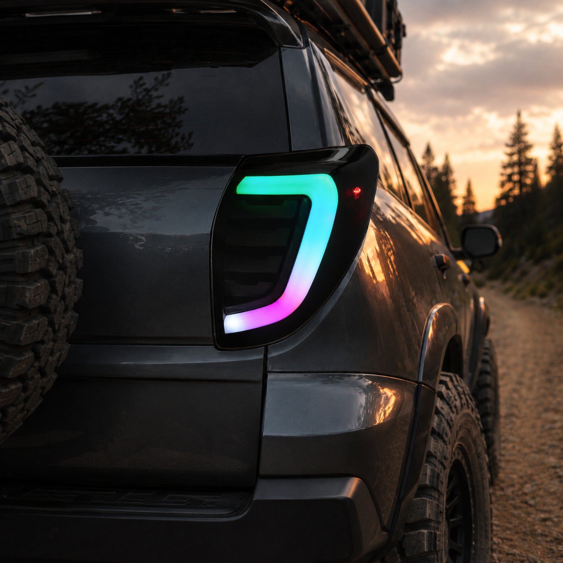 2009-2012 Toyota RAV4 Sequential LED Tail Lights — smoked sequential LED tail light detail lifted tires - T-RAV4-09-SRGB
