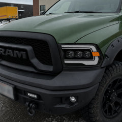 2009-2018 Ram 1500/2500/3500 and 2019-2024 Ram 1500 Classic LED Triple Projector Headlights — lights-off parking close-up — H-RAM09