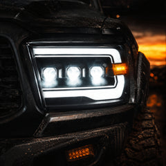 2009-2018 Dodge Ram 1500/2500/3500 LED Triple Projector Headlights — smoked close up — H-RAM09
