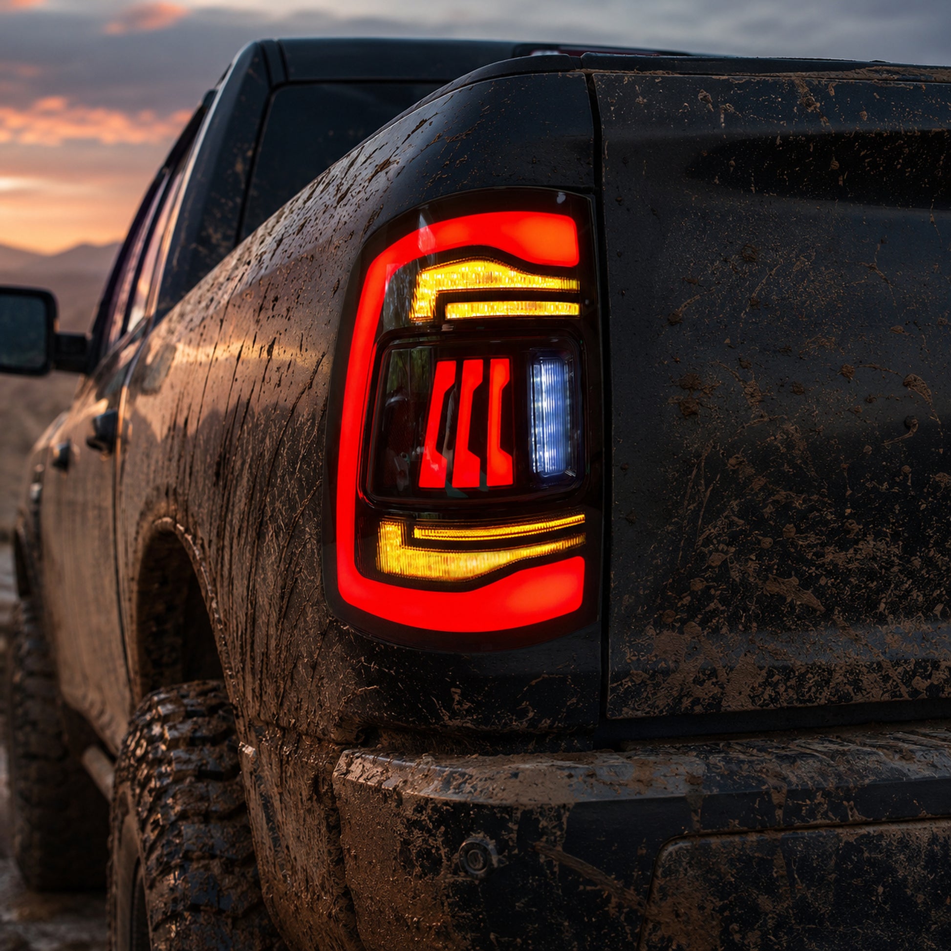 2009-2018 Dodge Ram 1500/2500/3500 Sequential LED Tail Lights — smoked sequential mud trail detail scene - T-RAM09-CR