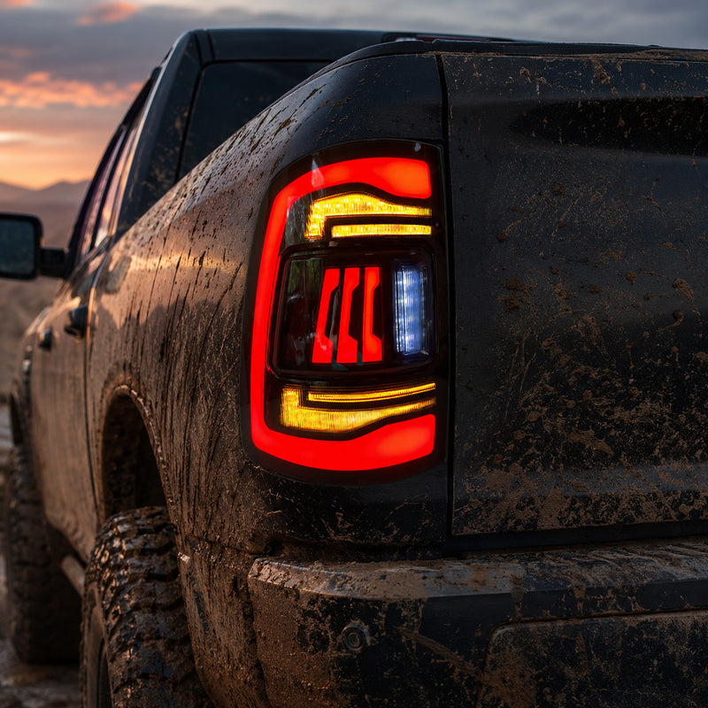 2009-2018 Dodge Ram 1500/2500/3500 Sequential LED Tail Lights — smoked sequential mud trail detail scene - T-RAM09-CR