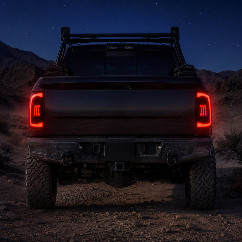 2009-2018 Dodge Ram 1500/2500/3500 Sequential LED Tail Lights — smoked sequential night rear view - T-RAM09-CR