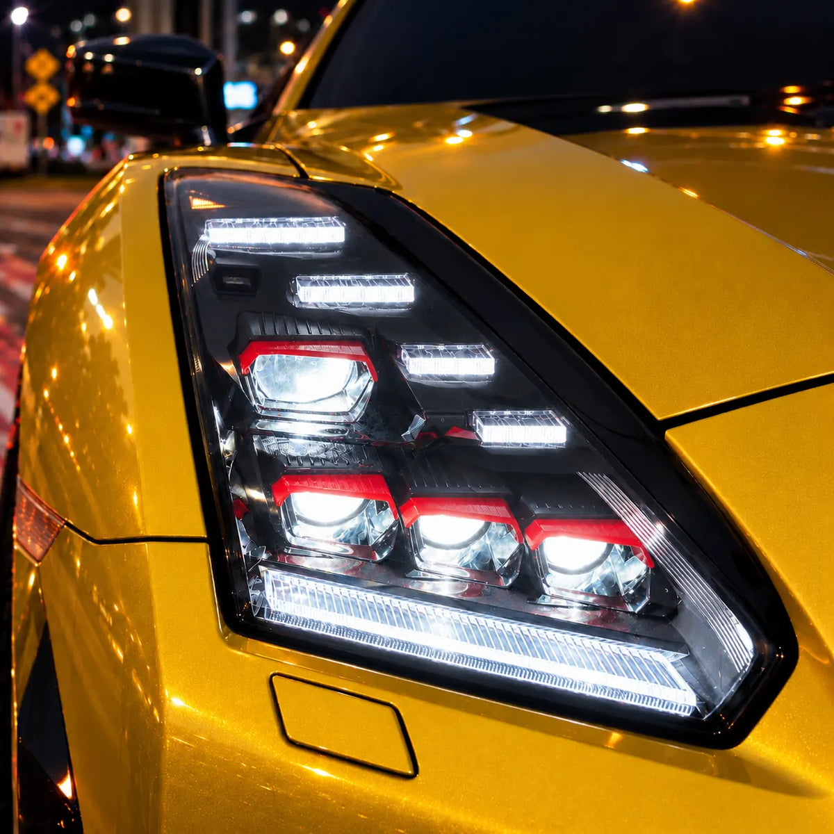 2009-2024 Nissan GT-R R35 LED Quad Projector Headlights Assembly — Pair — Yellow GT-R illuminated quad projectors close-up — H-GTR09