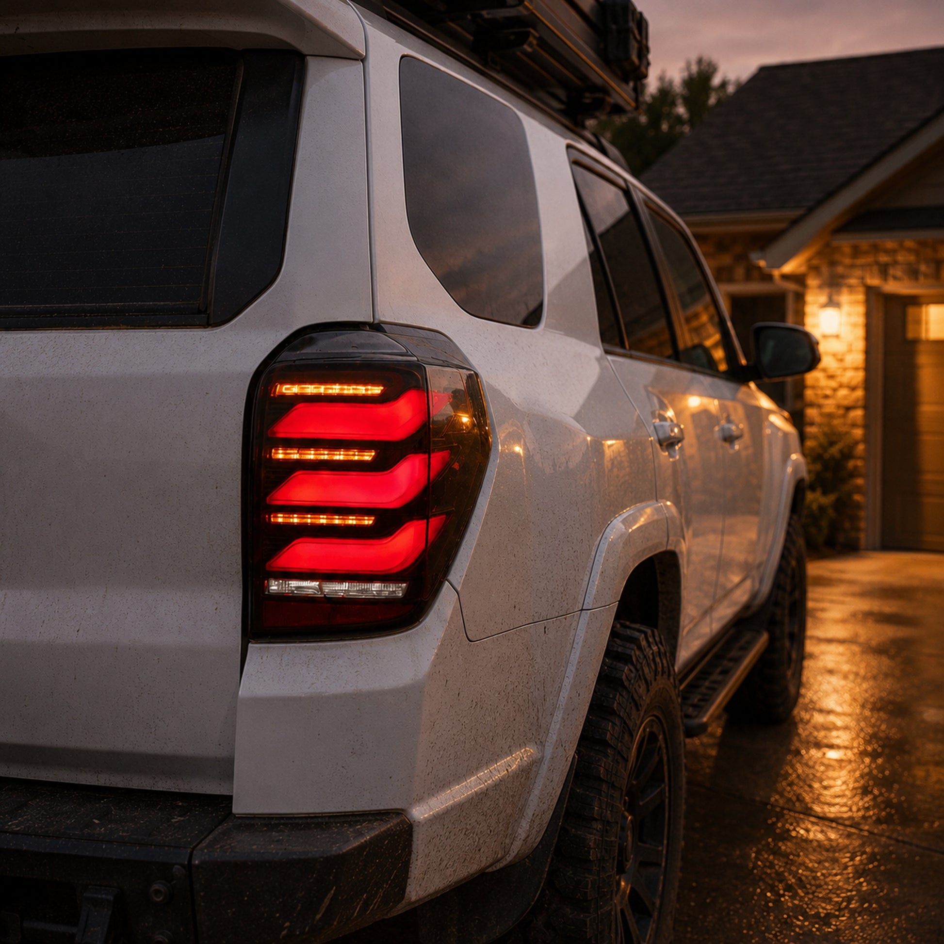 2010-2024 Toyota 4Runner Sequential LED Tail Lights — smoke red driveway dusk - T-4RN10-SR