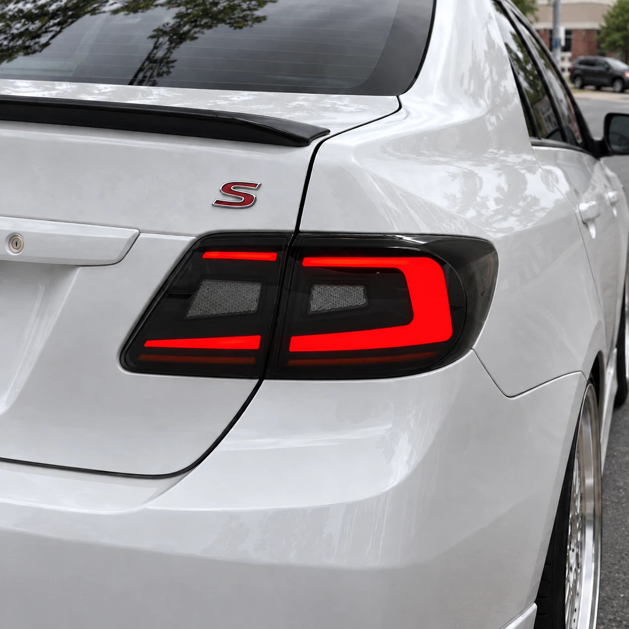 2011-2013 Toyota Corolla Sequential LED Tail Lights Assembly — running light illuminated close-up — T-COR11-SR