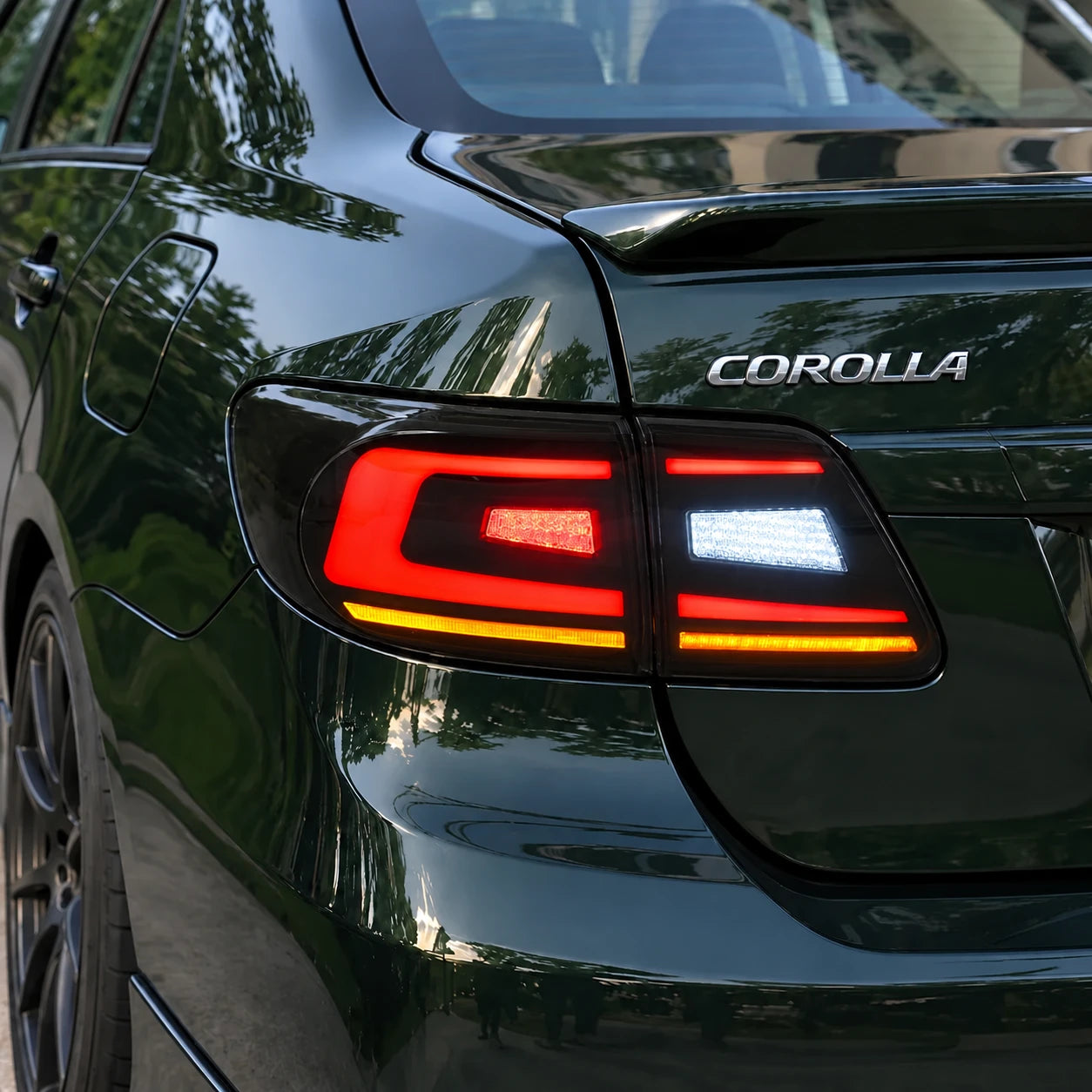 2011-2013 Toyota Corolla Sequential LED Tail Lights Assembly — running light illuminated rear view — T-COR11-SR