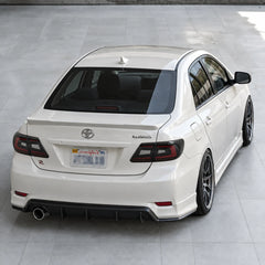 2011-2013 Toyota Corolla Sequential LED Tail Lights Assembly — illuminated rear styling view — T-COR11-SR