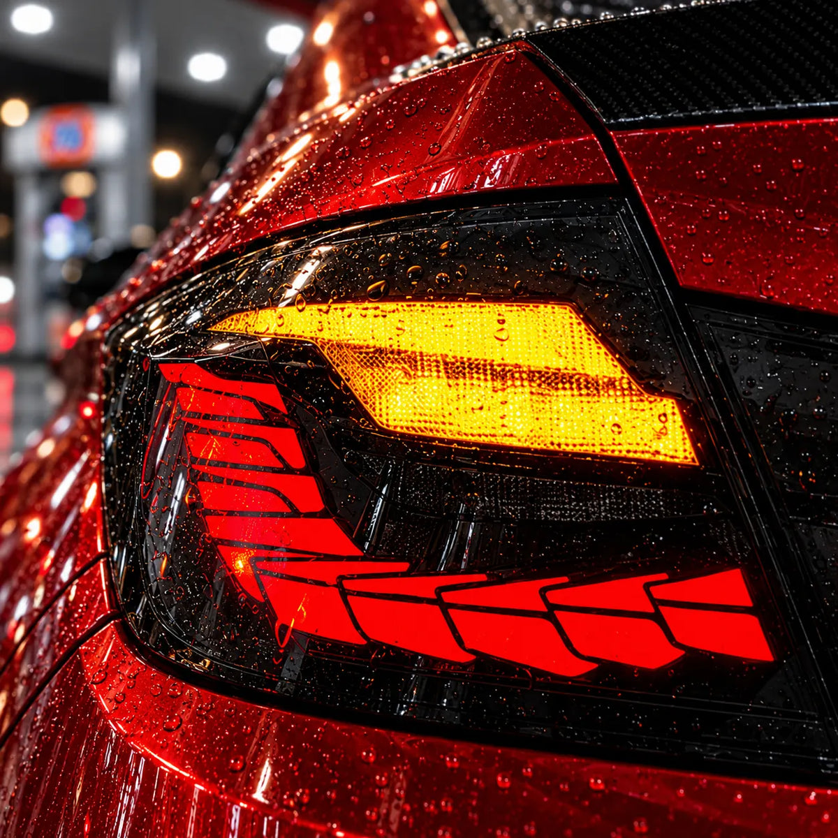 2011-2016 BMW 5 Series F10 / M5 F10 Sequential LED Tail Lights Assembly — 4-Piece Set — Rain-covered illuminated tail light close-up — T-5F10-SR