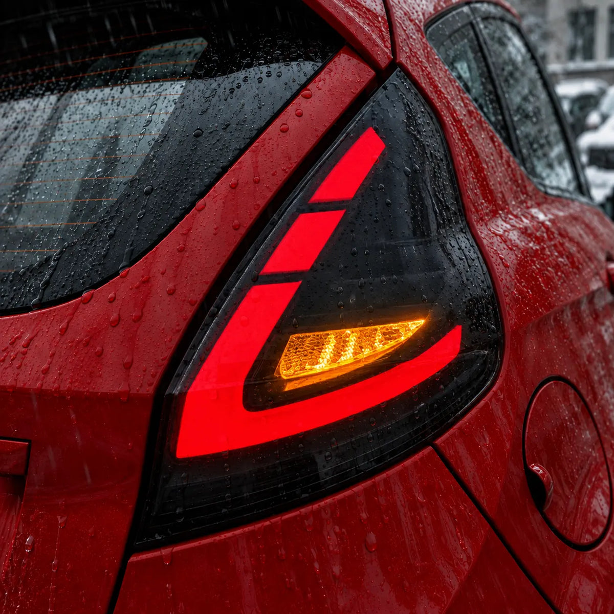 2011-2019 Ford Fiesta Hatchback & Fiesta ST Sequential LED Tail Lights Assembly — Pair — Amber Turn Signal Rain Close-Up — T-FIE11-SW