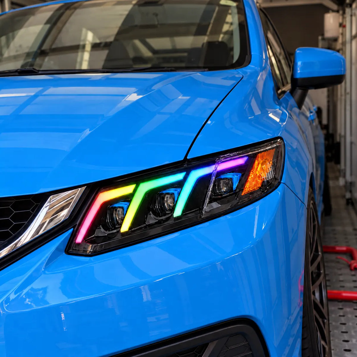 2012-2015 Honda Civic 9th Gen LED Triple Projector Headlights Assembly — Pair — Blue Civic RGB headlight close-up in garage — H-CIV12-3P-RGB