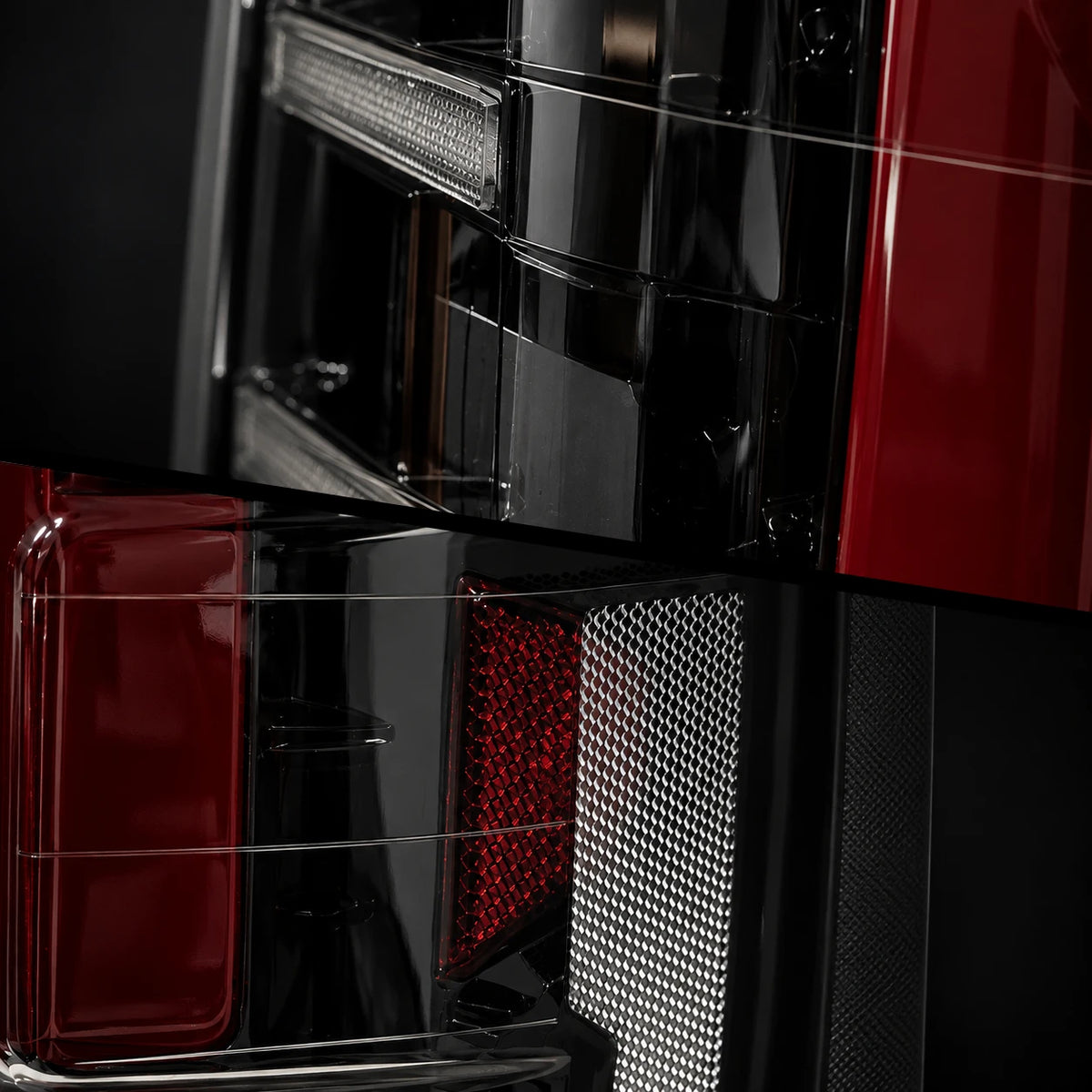 2014-2018 GMC Sierra 1500 & 2015-2019 Sierra 2500HD/3500HD LED Tail Lights Assembly — smoked lens internal reflector and housing detail close-up — T-SIE14-SR