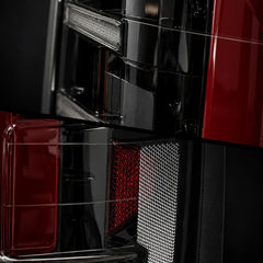 2014-2018 GMC Sierra 1500 & 2015-2019 Sierra 2500HD/3500HD LED Tail Lights Assembly — smoked lens internal reflector and housing detail close-up — T-SIE14-SR