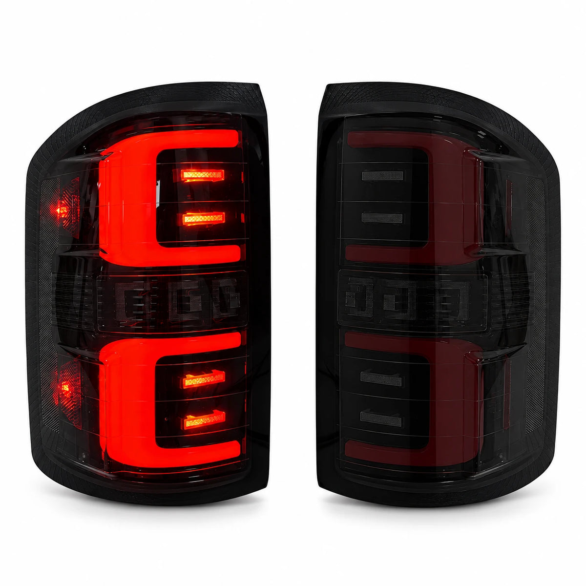 2014-2018 GMC Sierra 1500 & 2015-2019 Sierra 2500HD/3500HD LED Tail Lights Assembly — main product view with illuminated and off smoked lens — T-SIE14-SR