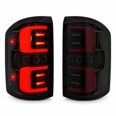 2014-2018 GMC Sierra 1500 & 2015-2019 Sierra 2500HD/3500HD LED Tail Lights Assembly — main product view with illuminated and off smoked lens — T-SIE14-SR