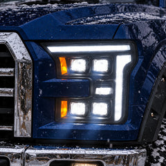 2015-2017 Ford F-150 & 2017-2020 Raptor (13th Gen) LED Projector Headlights Assembly — Pair (Quad Projector) — Quad projector headlights illuminated close-up — H-F150-15-Q