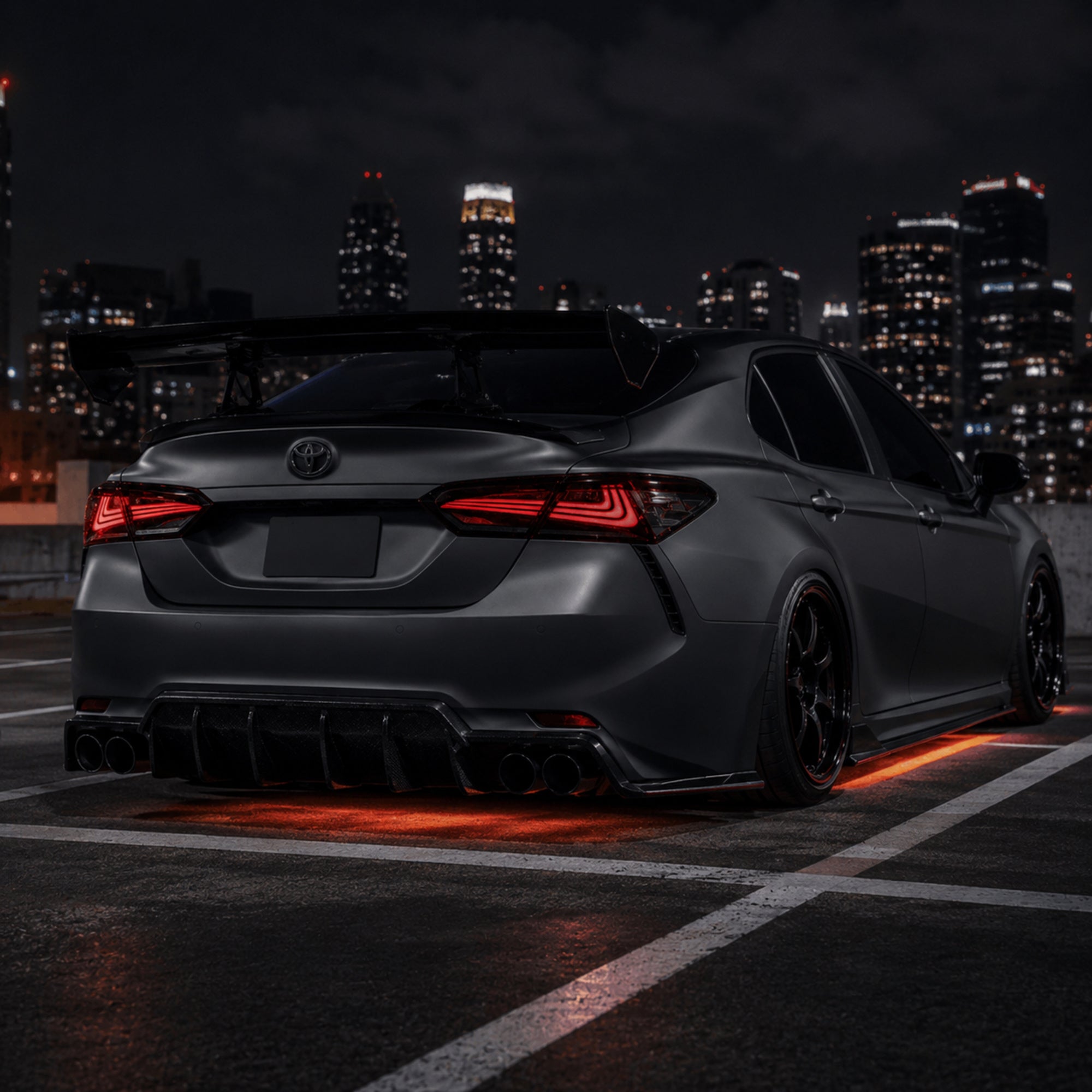 2018-2024 Toyota Camry 8th Gen Sequential LED Tail Lights — smoked red rectilinear installed rear45 - T-CAM18-HL-SR