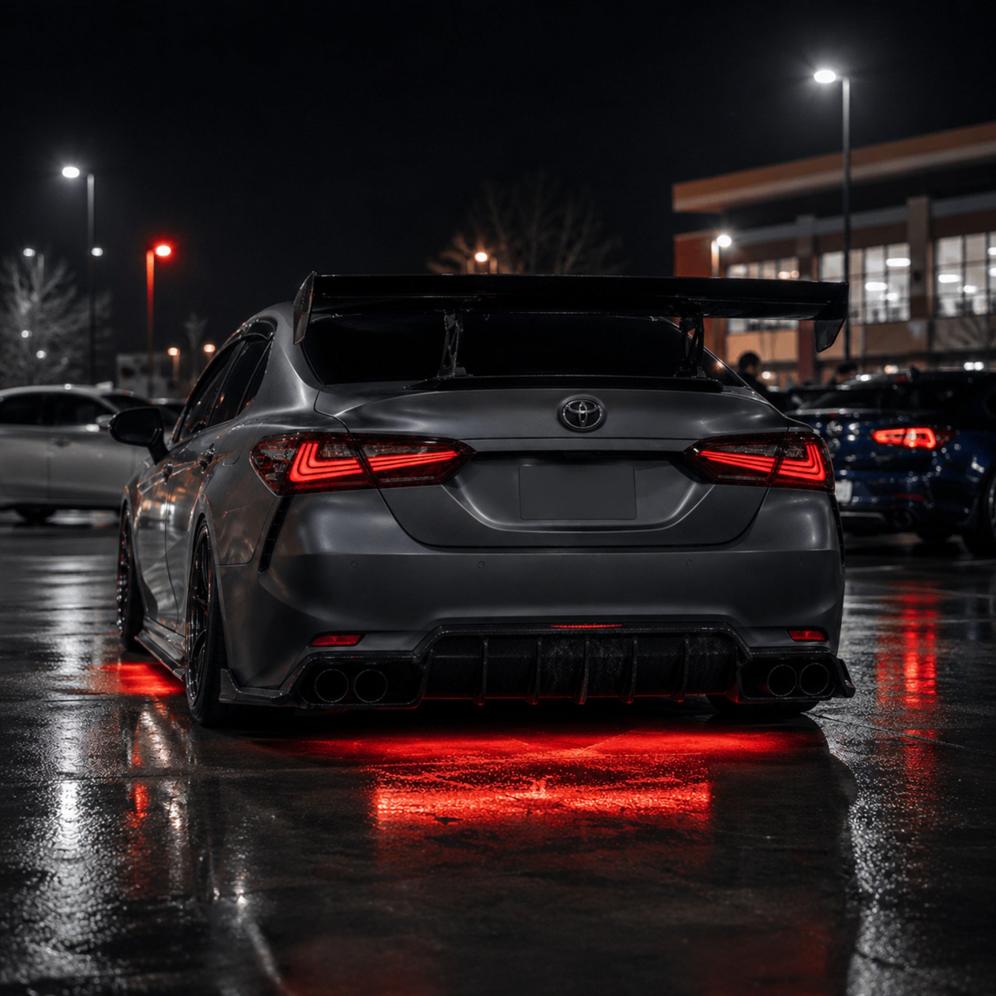 2018-2024 Toyota Camry 8th Gen Sequential LED Tail Lights — smoked red rectilinear parking lot rear view - T-CAM18-HL-SR