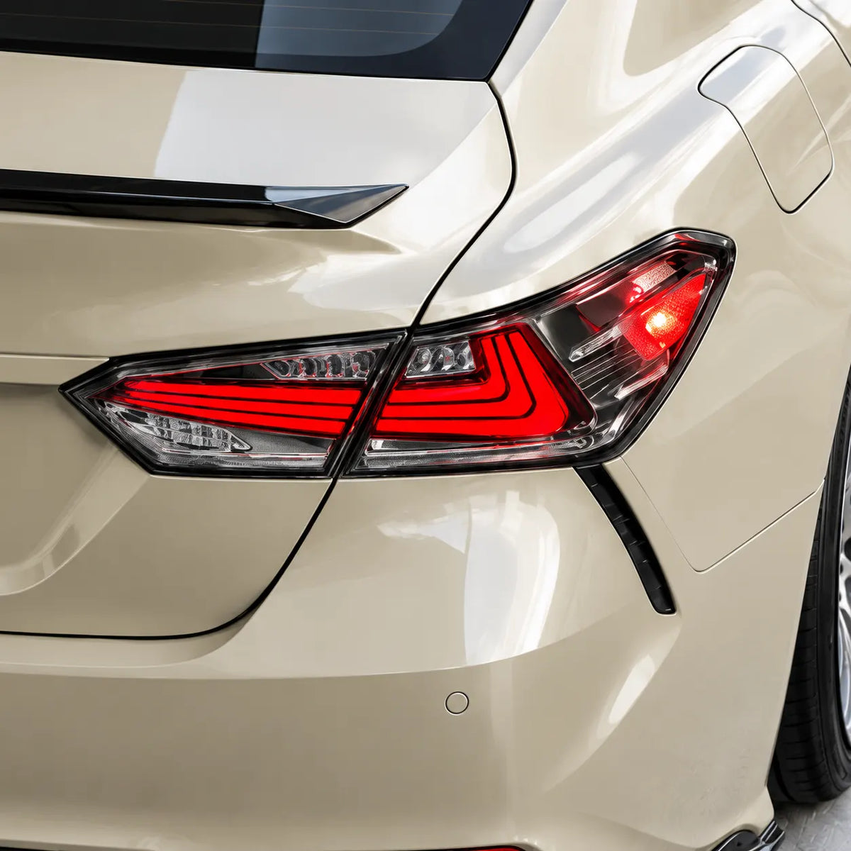 2018-2024 Toyota Camry 8th Gen Sequential LED Tail Lights Assembly — 4-Piece Set (Halo - Clear White) — Red running light close-up on cream Camry — T-CAM18-HL-CW